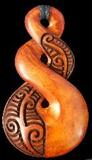 New Zealand NZ Maori Carving Carved Necklace Pendant Kiwiana Taonga Gift Traditional Souvenir Double Twist Stained Brown Bone